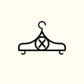 Fashion vector logo. Clothes hanger logo. Letter X logo. Tailor emblem. Wardrobe icon - Vecto