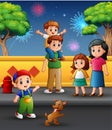 Happy family outdoors with a background of fireworks in the sky Royalty Free Stock Photo