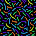 Seamless pattern of colorful sprinkles in vector on black background. Royalty Free Stock Photo