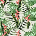 Seamless pattern with tropical leaves and paradise heliconia flowers. Royalty Free Stock Photo