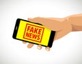 Fake news rubber stamp cell phone
