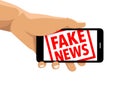 Fake news rubber stamp cell phone