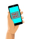 Fake news rubber stamp cell phone