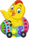 Cartoon baby chick riding an easter egg car