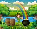 Leprechaun holding a mug beer on the nature and rainbow landscape