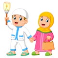 Moslem couples walking and holding torch