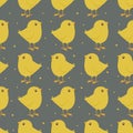 Vector seamless pattern with cartoon yellow chicks on gray background.