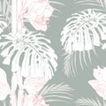 Pink line lily flowers with exotic monstera leaves, light green background. Floral seamless pattern. Royalty Free Stock Photo