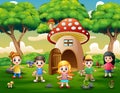 Happy kids playing on the fantasy house of mushroom Royalty Free Stock Photo