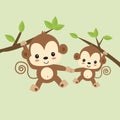 Cute mom and baby monkey hanging on tree. Royalty Free Stock Photo