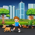 Happy children walking on the city road wih animal pet Royalty Free Stock Photo