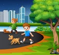 Childrens walking with their pets at the city park