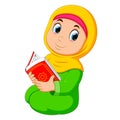 the beautiful girl with yellow veil is holding al quran