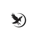 Flying Raven crow on the ring black isolated background logo icon design vector illustration Royalty Free Stock Photo