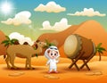 Arab boy with camel in the desert landscape