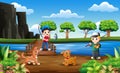 Happy boys fishing with his pet at the wooden bridge Royalty Free Stock Photo