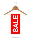 Sale sign on a wooden hanger Royalty Free Stock Photo