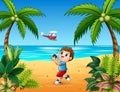 Boy playing remote controlled airplane at the beach