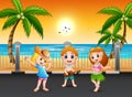 Boy playing guitar and hawaiian girl hula dancing at the seaside street Royalty Free Stock Photo