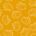 Pumpkins on orange background seamless pattern. Halloween design. Royalty Free Stock Photo