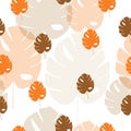 Seamless pattern with orange and brown tropical leaves vector Royalty Free Stock Photo