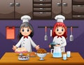 Two women chef preparing food in the kitchen