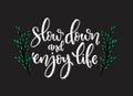 Vector hand drawn inspirational lettering. Slow down and enjoy your life. Motivational lettered sketch style phrase Royalty Free Stock Photo