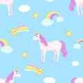 Seamless pattern with unicorns, stars, rainbow and clouds on blue background. Royalty Free Stock Photo