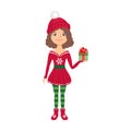 Little christmas girl in red hat holds gift box with bow. Cute little girl celebrates New Year