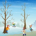 Happy children playing snow on the snow field Royalty Free Stock Photo