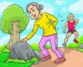 Senior woman feel pain at the back at the park while jogging