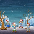 Children singing christmas carols on winter landscape Royalty Free Stock Photo