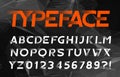Abstract alphabet font. Speed effect oblique letters and numbers. Dark polygonal background. Royalty Free Stock Photo