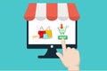 Flat design vector of human pointing on buy icon for shopping online Royalty Free Stock Photo