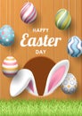 Happy Easter background with realistic painted eggs, grass, and rabbit ears.