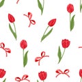 Red tulips flowers with green leaves and stems and bows on a white background seamless pattern. Royalty Free Stock Photo