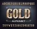 Gold alphabet font. 3d ornate golden metal letters and numbers. Royalty Free Stock Photo