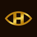 Elegant golden eye initial H