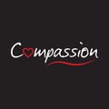 Compassion word text with red love heart - typography design on black background Royalty Free Stock Photo