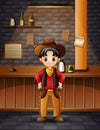 A boy in cowboy clothes at the bar