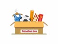 Books, toys, and clothing in donation box cardboard ready send for charity in cartoon flat illustration vector isolated in white b