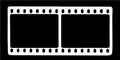 Black film strip icon in isolate on a black background. Royalty Free Stock Photo