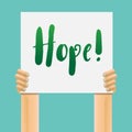 Hand holding hope text on white poster,Hope aspiration sign