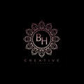 Letter BH Elegant initial logo Lotus vector