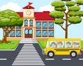 School building, bus and front yard with students children Royalty Free Stock Photo