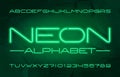 Neon alphabet font. Green neon color letters and numbers.