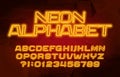 Neon alphabet font. Yellow neon color letters and numbers. Abstract background.