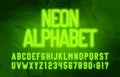 Neon alphabet font. Green neon color letters and numbers. Abstract background.