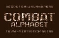 Combat alphabet font. Camo stencil letters and numbers on a dark background.