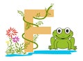 Letter F with green grass vines and little green frog Royalty Free Stock Photo